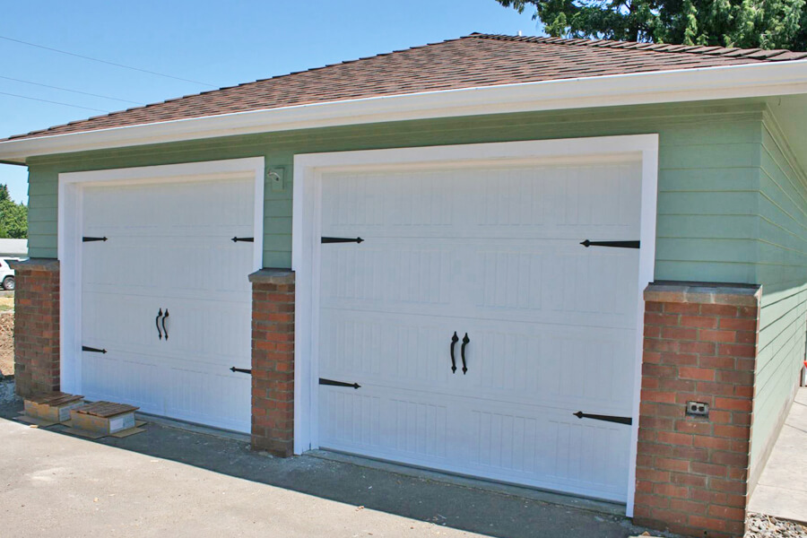 Photo of a double garage on a ranch style home remodel.