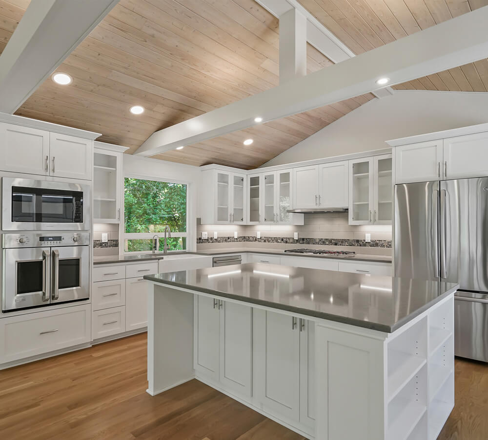 Photo of beautiful white kitchen remodel.