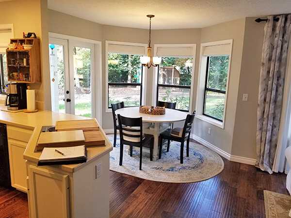 Photo of before kitchen redesign kitchen-shows island seperating kitchen and dining space.