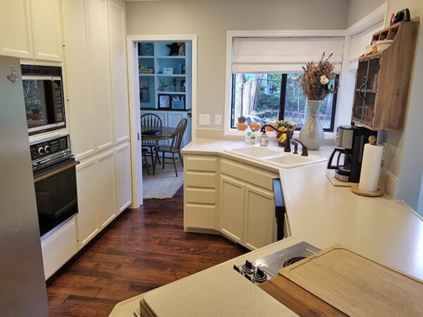 Before photo of kitchen showing narrow kitchen