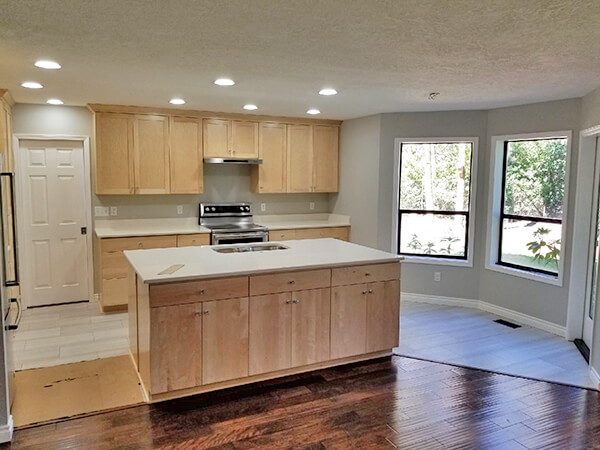 Photo of redesigned kitchen with open concept-shows dining area and kitchen as one room