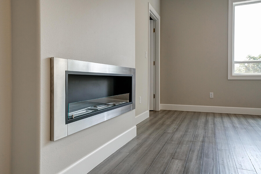 Photo of Contemporary Craftsman fireplace with polished aluminum frame