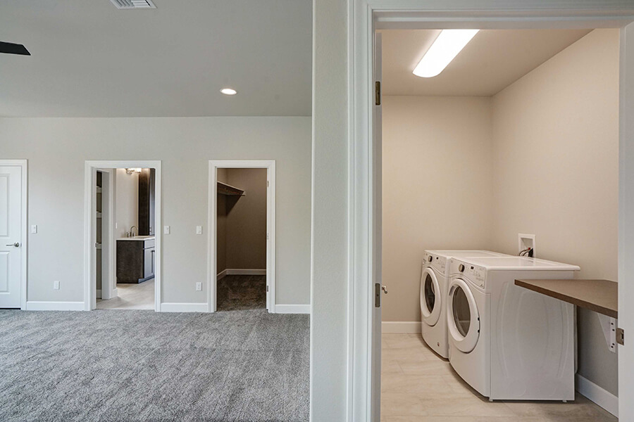 Photo of Contemporary Craftsman laundry room view froom outside of laundry room door